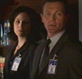 Agents Reyes and Doggett wonder where Lucy Lawless is